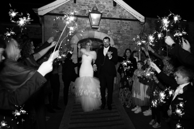 A%20couple%20having%20their%20sparkler%20exit%20at%20Pencoed%20House%20Estate